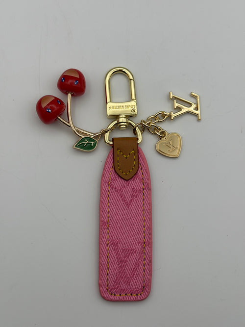 Louis Vuitton-style cherry keychain, playful luxury-inspired accessory
